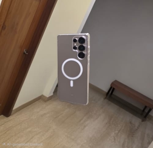 Reviewer's Anti Yellow Magsafe Clear Case on a Samsung phone, showing the transparent back and white magnetic ring.