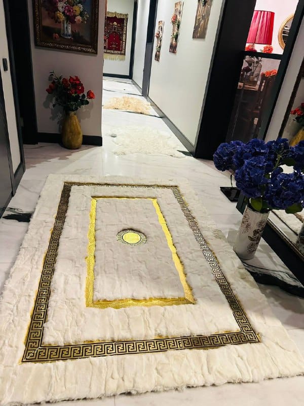 Customer photo review of Handmade White Rabbit Fur Area Rug with Gold Greek Key Border
