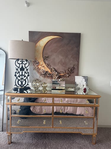 Customer's luminous Moon and Roses Wall Art hung above a mirrored dresser, adding an elegant touch to the room.