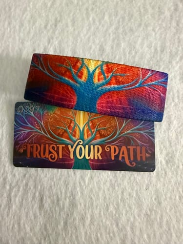 Reviewer's colorful Trust Your Path Bracelet shown with its matching art card that reads 'Trust Your Path'.