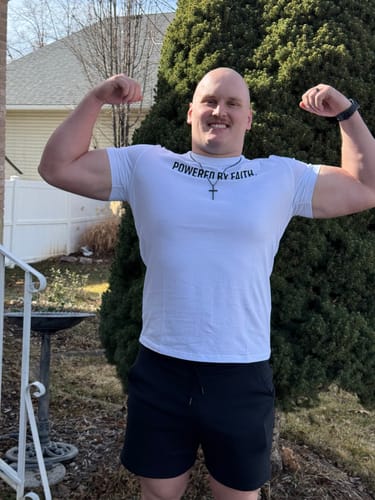 Customer photo review of Powered By Faith Performance Tee