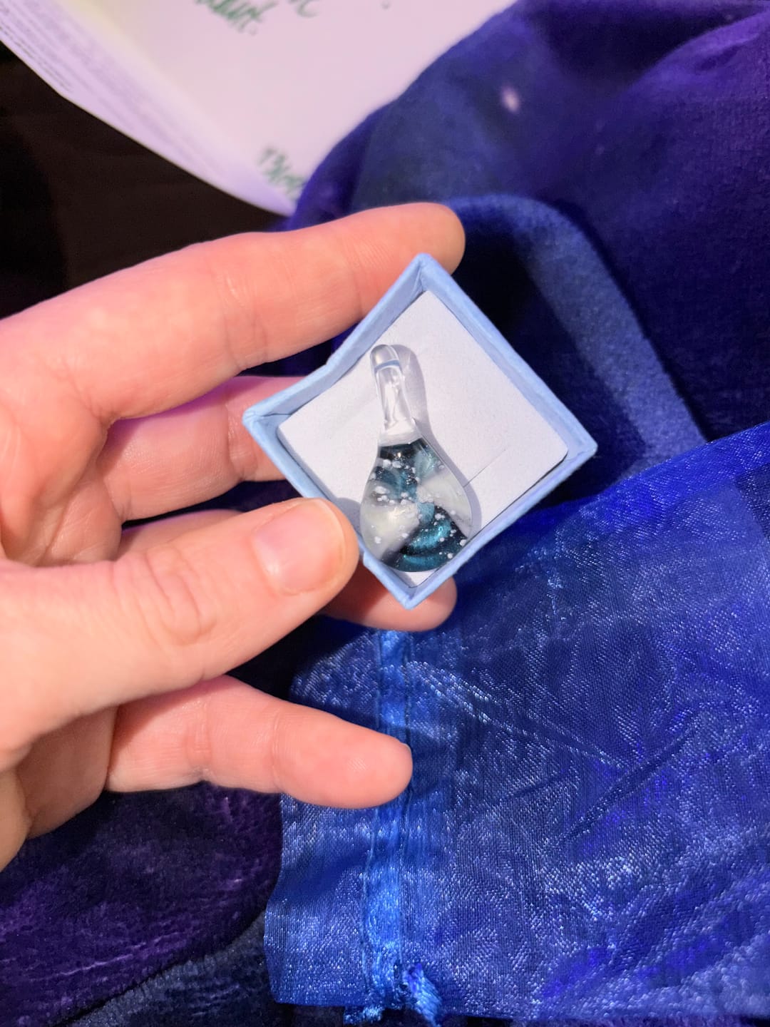 Customer photo review of Ocean Crash Pendant with Infused Cremation Ashes