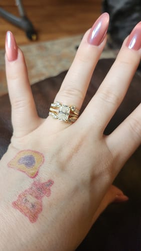 Customer photo review of Moissanite 3.5Ct Radiant Cut Yellow Gold Wedding Ring with Enhancer Ring