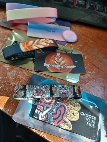 Customer's Subscription Mystery 3-Pack showing the 'Fight On', 'Espresso Yourself', and 'Choose Your Side' wristbands.