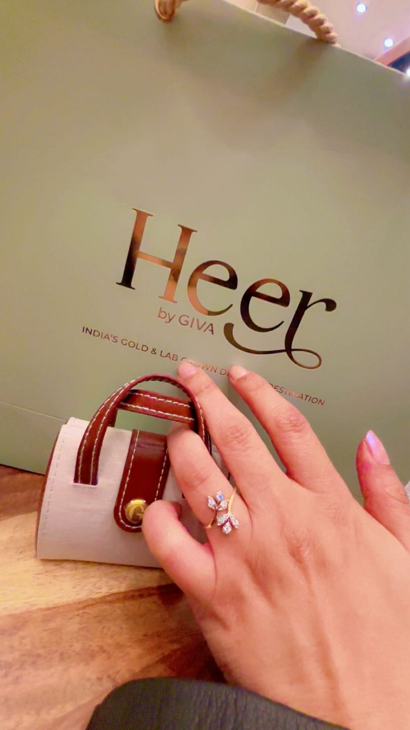 Customer photo review of Dainty Solitaire Ring