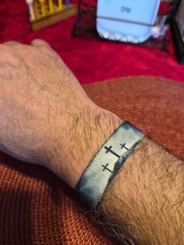 Customer wearing the Eternal Life Bible Verse Bracelet, showing the three crosses design.