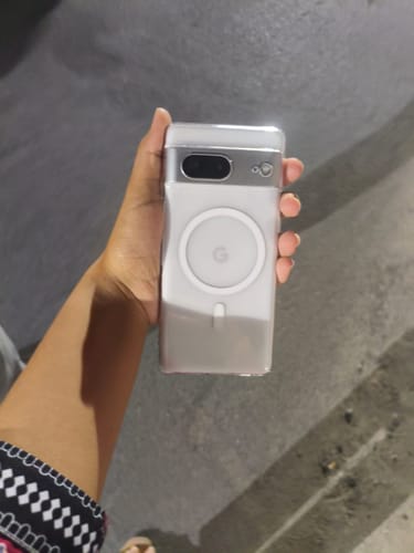 Reviewer holding a Google Pixel 7 in the sleek, frosted Anti Yellow Magsafe Clear Case.