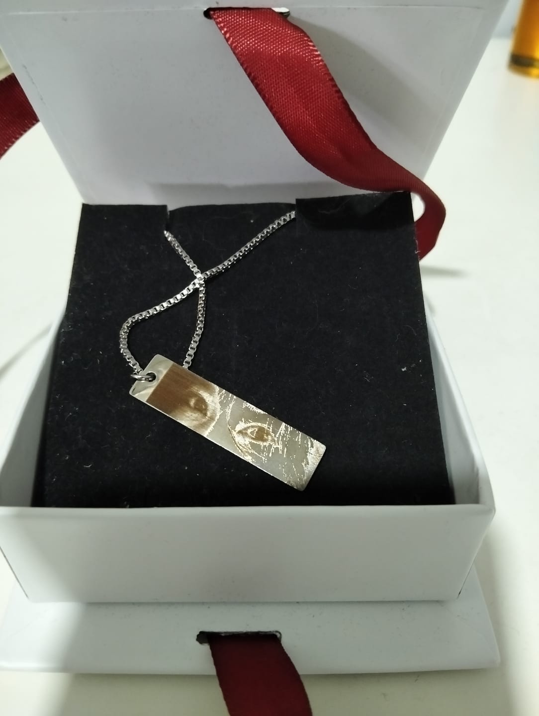 Customer photo review of Personalized Eye Photo Necklace