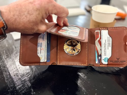 Customer photo review of Badge Trifold Wallet - Chestnut Brown