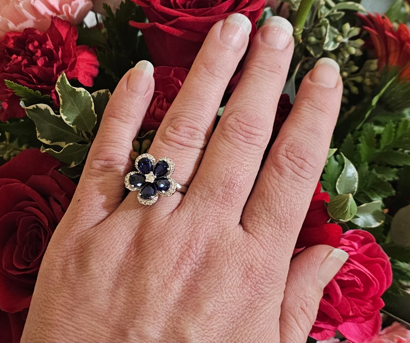 Customer photo review of Five Petal Halo Pear Sapphire Flower Ring In Sterling Silver