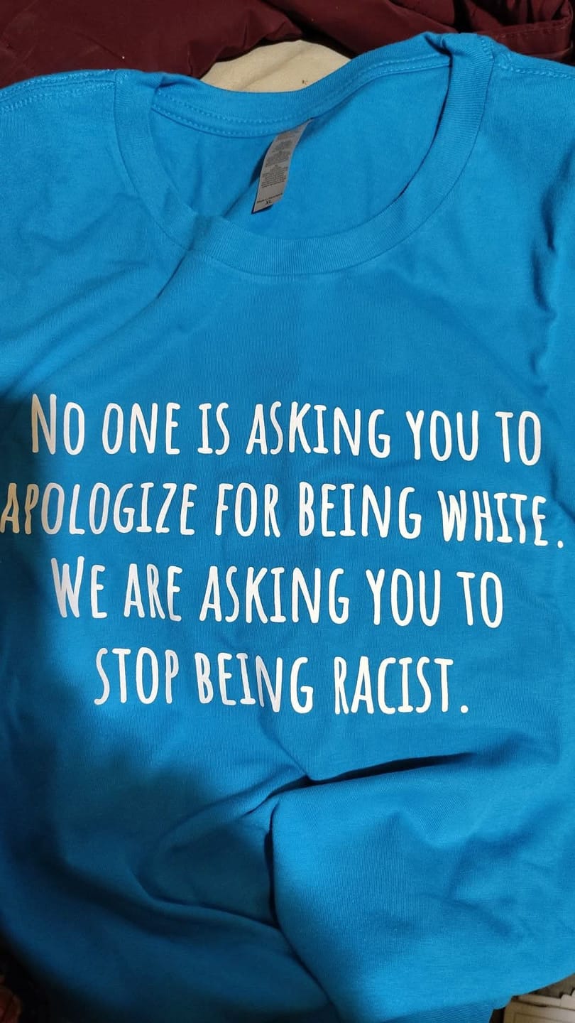 Customer photo review of No one is asking you to apologize for being white. We are asking you to stop being racist Unisex Tee