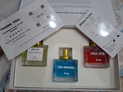 Reviewer's OUD Supreme BUNDLE showing the Oud Serene, Oud Nirvana, and Ora 1776 perfume bottles in the box.