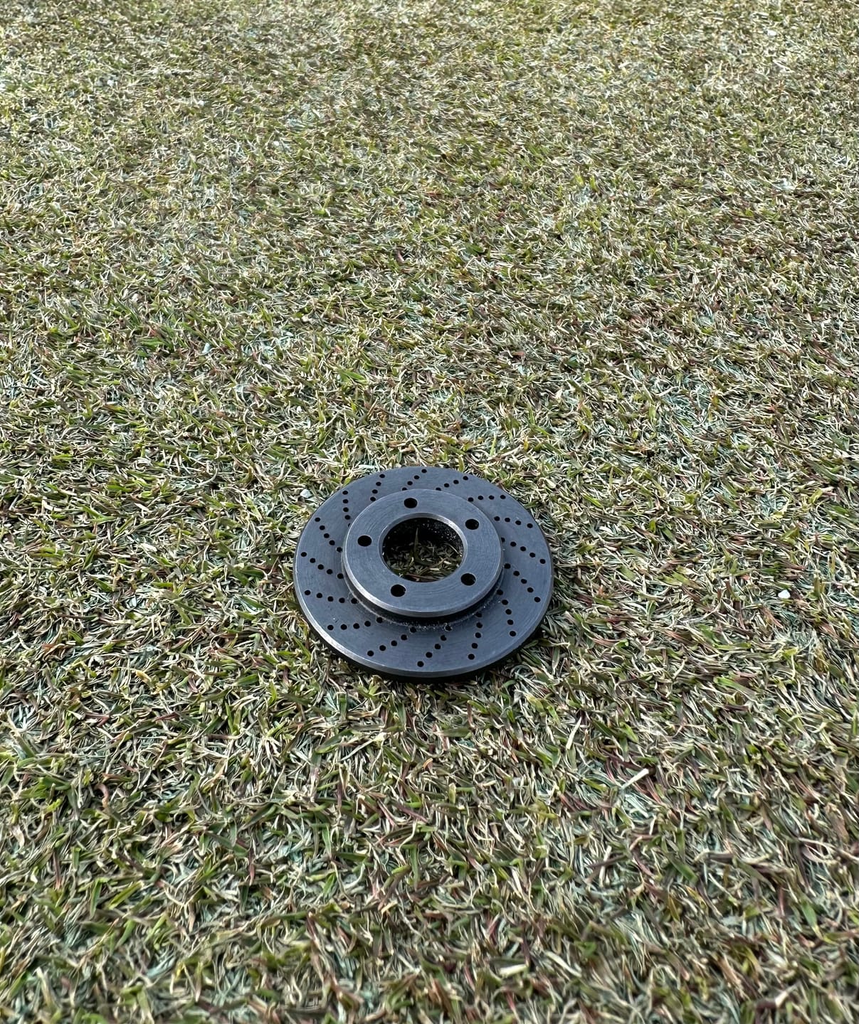 Customer photo review of Rotor Golf Ball Marker - Black Oxide Carbon Steel | Kraken Golf