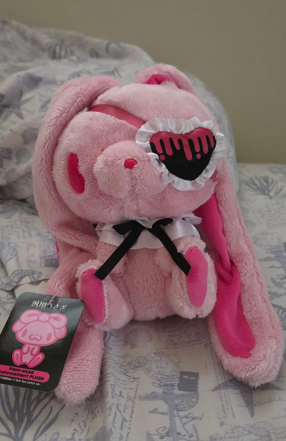 Customer photo review of Gloomy Eye Patch Palm-Sized Sitting Plush (Pink)
