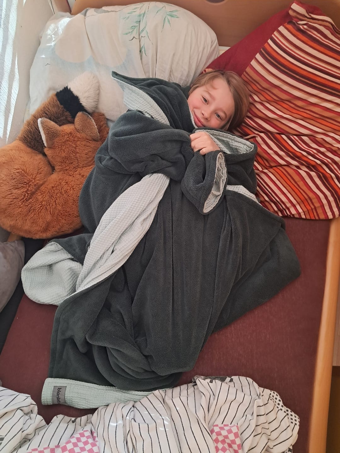 Customer photo review of Kuscheldecke mit Ärmeln · Vollkommen · Mint · Smaragdgrün