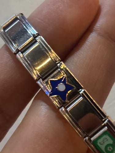 Customer photo review of Charm Estrella Azul Con Circulo Blanco