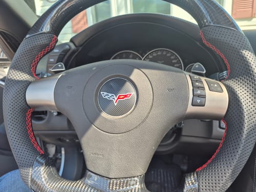 Customer photo review of Genuine Carbon Fiber Steering Wheel With Button Trim For C6 Corvette 2006-2011