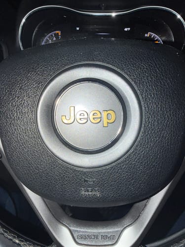 Customer photo review of JEEP Steering Wheel Emblem Overlay Decal — 30+ Colors & Designs (Flag, Topo, Animal, Solid)