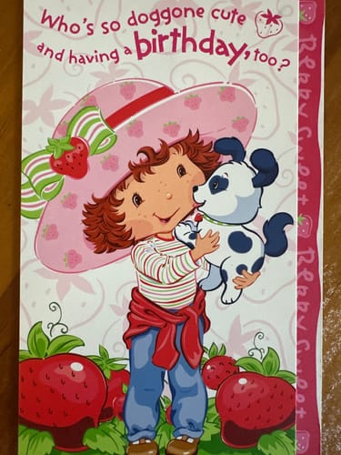 Reviewer's image for the Peanuts Snoopy Gel Pen shows an illustrated birthday card.
