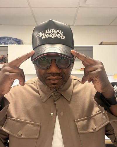 Customer photo review of Pu Leather Suede Bottom Trucker Hat