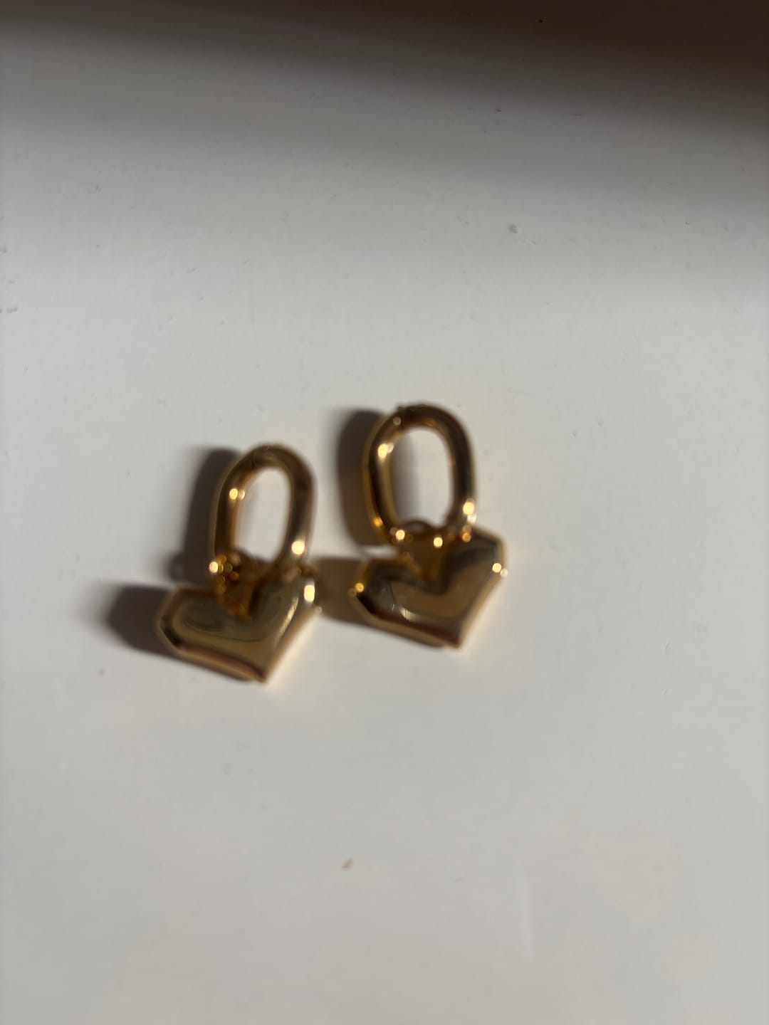 Customer photo review of Peripheral Heart Earrings