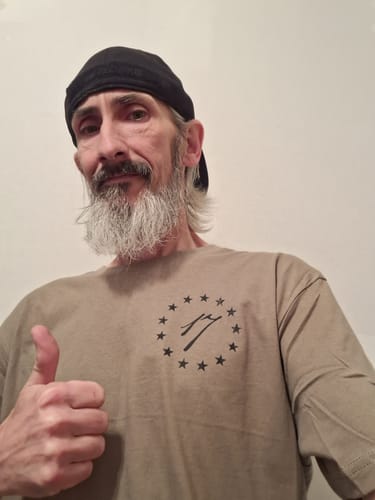 Customer photo review of GUNS OF UNITY TEE