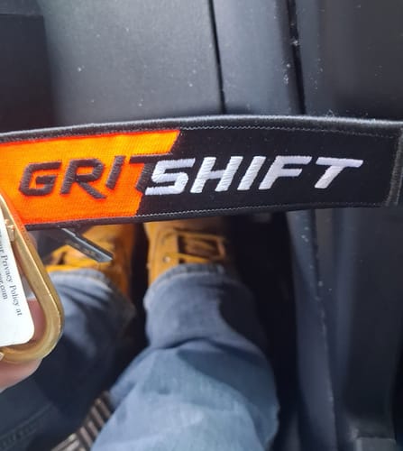 Customer photo review of GritShift Keychain and Sticker Pack