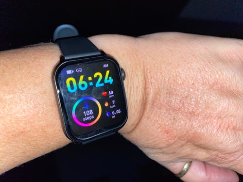 Customer's Gard Pro Health Smartwatch 3 on their wrist with its colorful illuminated screen displaying health metrics.