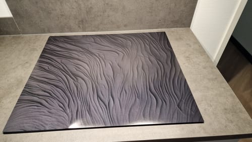 Customer photo review of Inductiebeschermer - Abstract - Duinen - Zwart