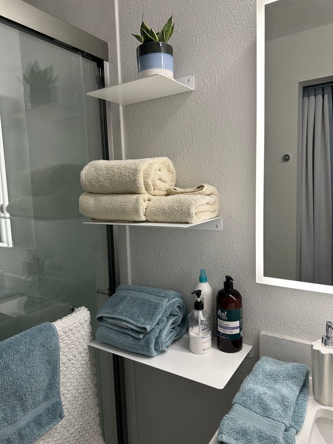 Customer photo review of Modern Metal Floating Shelf - Minimalist Wall Storage & Display