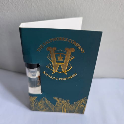 Customer's sample vial of Honeyberry perfume in a branded teal card.