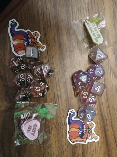 Customer photo review of Sweetheart Mystery Dice – Hearts & Flowers dice, unique fun stickers and pins!