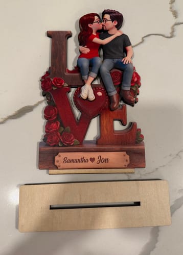 Customer's Eternal LOVE plaque shown detached from its wooden display base in the foreground.