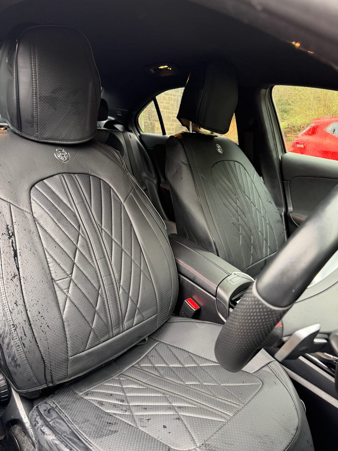 Zahra K.'s car with Black seat covers