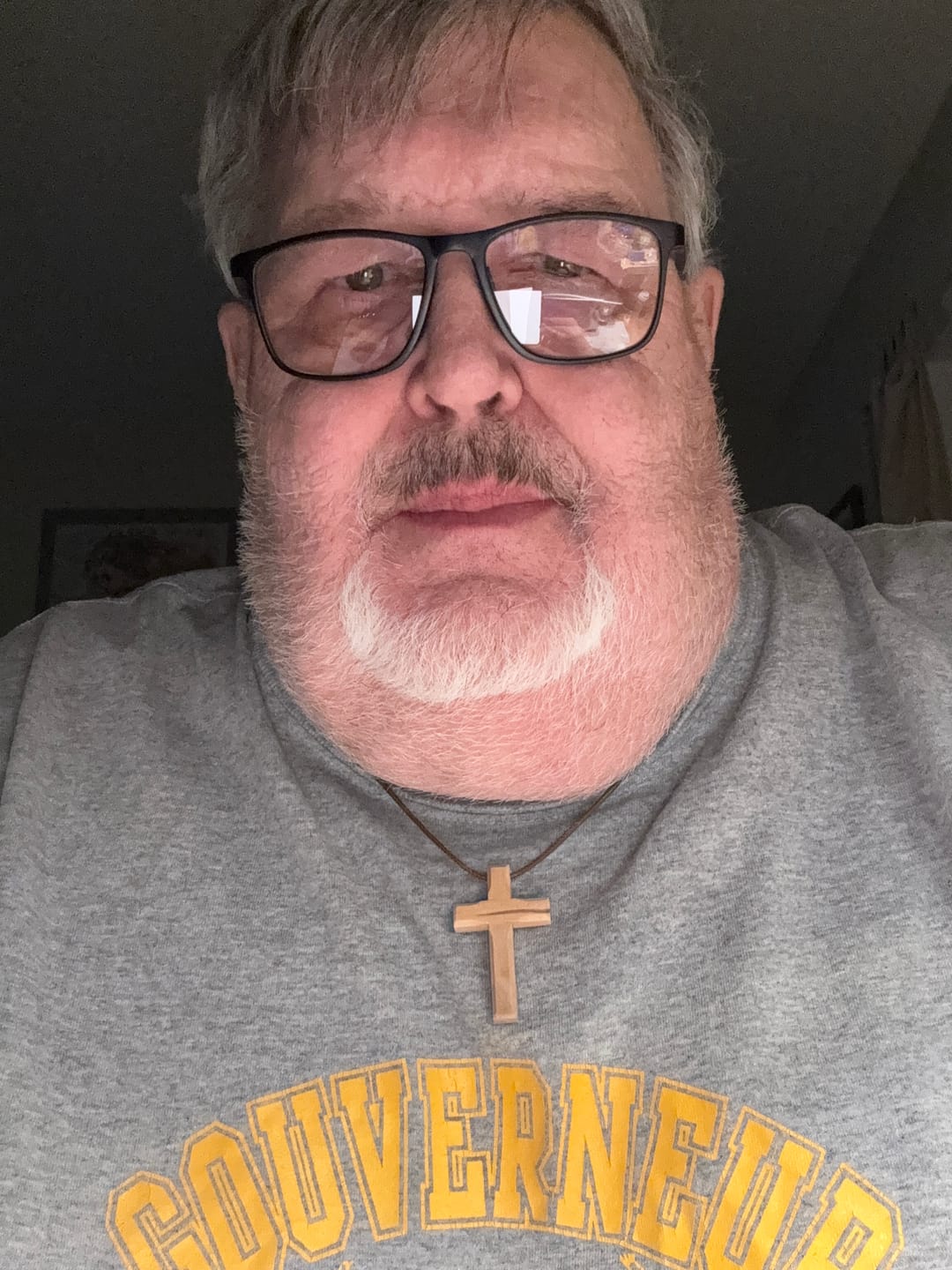 Customer photo review of Holy Land Plain Olive Wood Cross Pendant