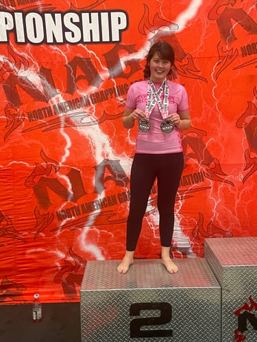 Customer photo review of Pretty In Pink BJJ Rash Guard
