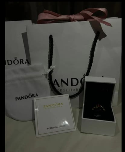 Customer photo review of ANILLO PANDORA PINCESA DISNEY BELLA Y LA BESTIA ROSA ENCANTADA ORO 14K