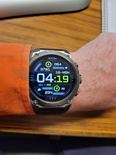 Customer's Gard Pro Ultra 3 watch on their wrist with the digital display showing time, steps, and heart rate.
