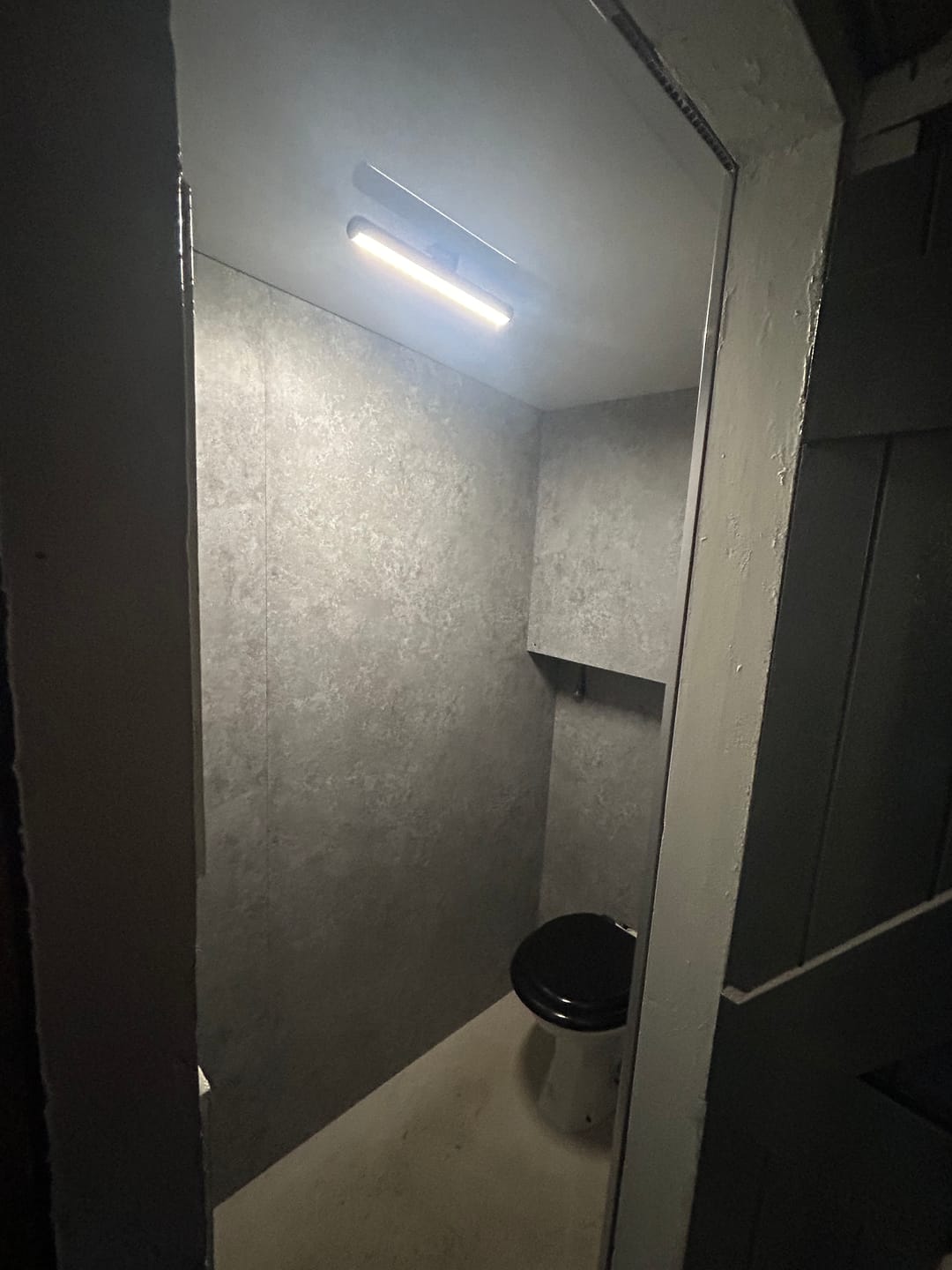 Customer photo review of Premium Grey Concrete Matt Shower Wall Panel – 1M x 2.4M