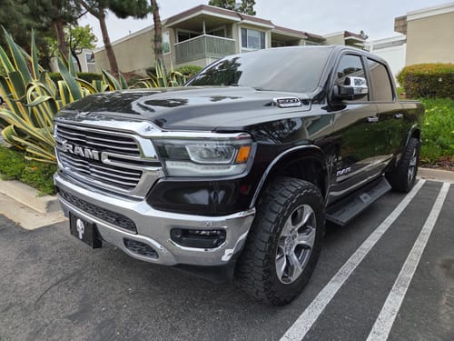 Customer's black Ram truck with the 2-inch wheel spacers installed for a wider tire stance.