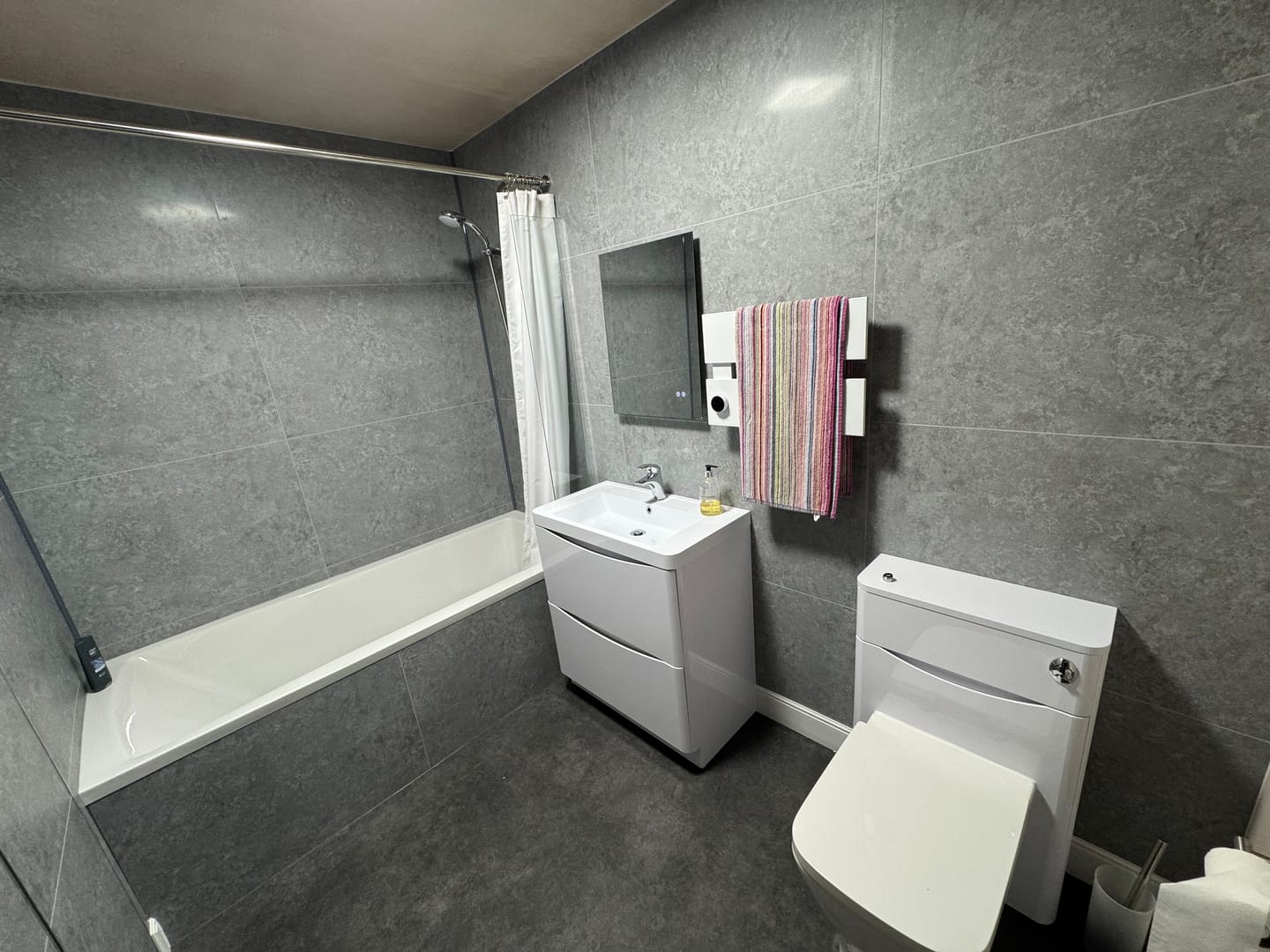 Customer photo review of 10mm Large Tile Light Concrete Matt Shower Panel 1M x 2.4M