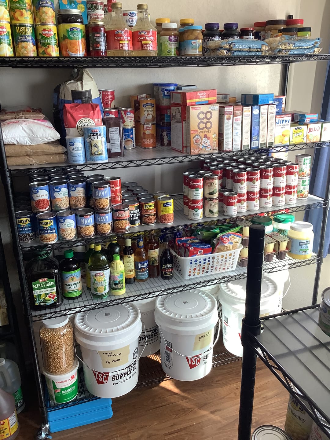 Customer photo review of Reibii 60" W x 73" H Wire Storage Shelves on Wheels, 5-Shelf Adjustable, 3200lbs Heavy Duty Metal Shelving for Garage Kitchen Pantry