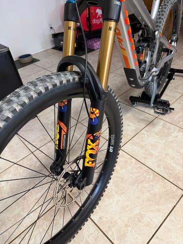 Customer's Custom Fox 38 Decal with colorful graphics shown on a Pivot Firebird mountain bike fork.