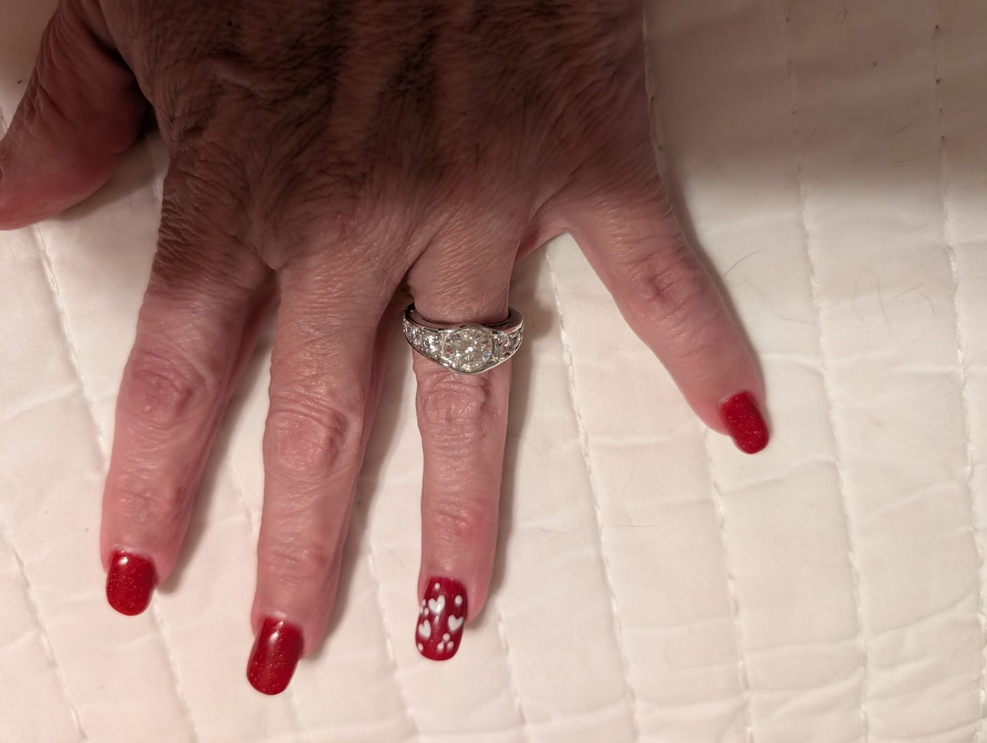 Customer photo review of Bezel Round Moissanite Channel Euro Shank Engagement Ring