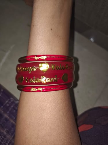 Customer photo review of “Mayur Light Red - A Divya Shringar Bangle” (2 pis) (Transparent Red)