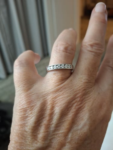 Customer photo review of Channel Set Moissanite Half Eternity Wedding Band Ring In Sterling Silver