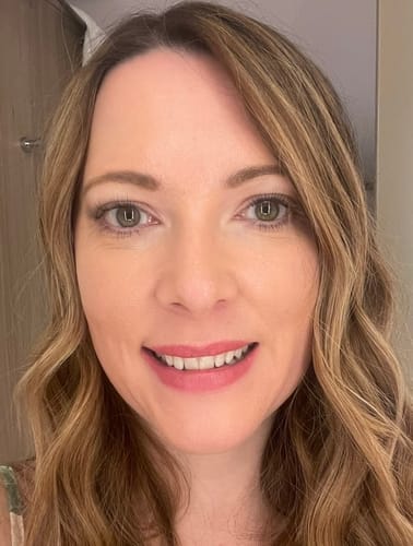 Customer smiling and showing the natural, subtle look of the Classique Length lashes.