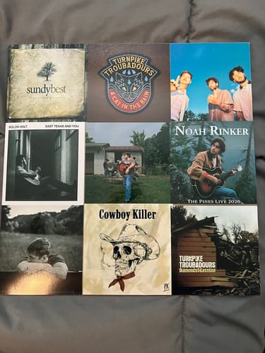 Customer's custom vinyl record showing a personalized album cover with a collage of nine square images.