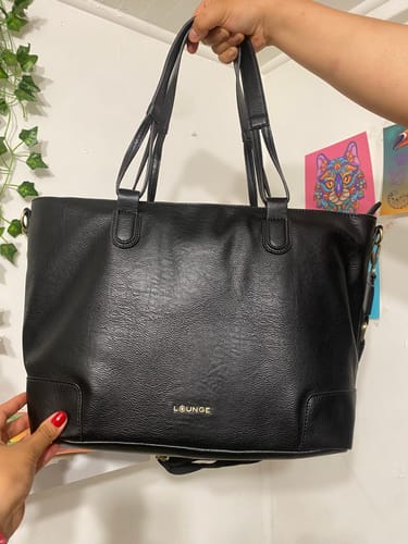 Reseña con foto de un cliente sobre Cartera Tote Notebook Costuras