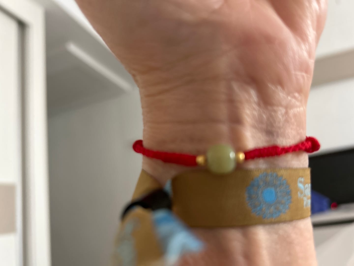 Customer photo review of Buddha Stones Handmade Jade Lucky Bead Prosperity Braided Bracelet